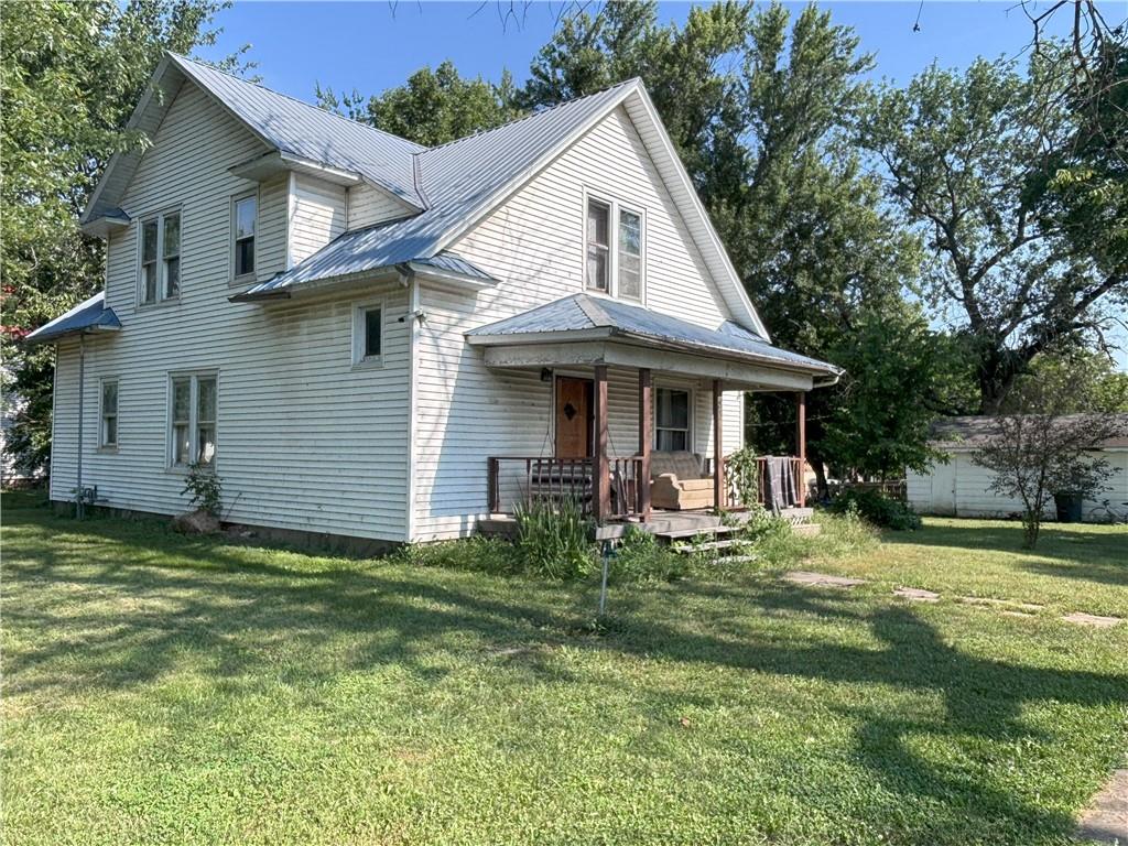 321 N 3rd St, Drexel, MO 64742