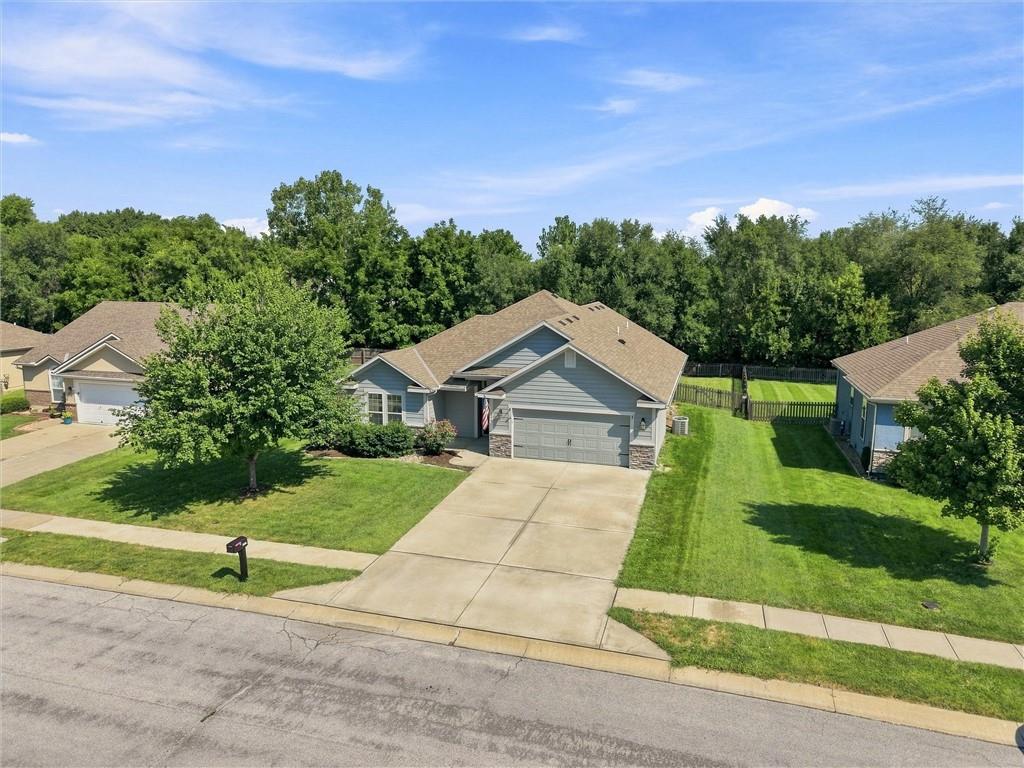 308 E Olive St, Raymore, MO 64083