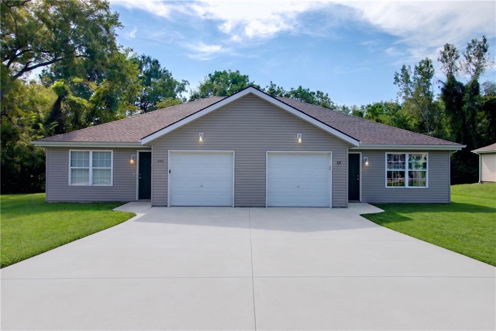 207-209 Sycamore St, Harrisonville, MO 64701