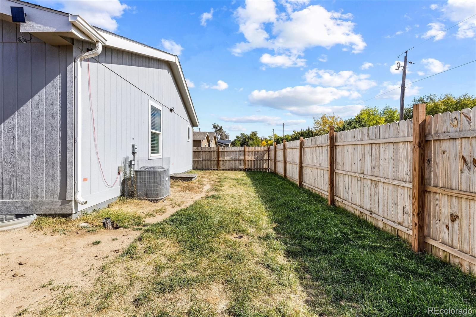 104 Juniper Cir, Log Lane Village, CO 80705