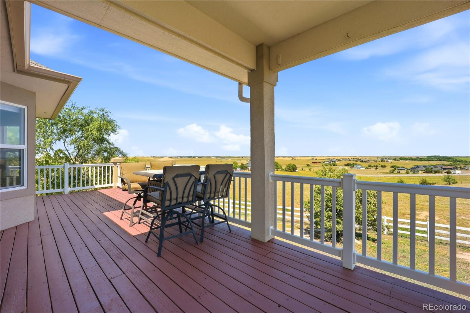 Covered deck at 35880 E 149th Ct