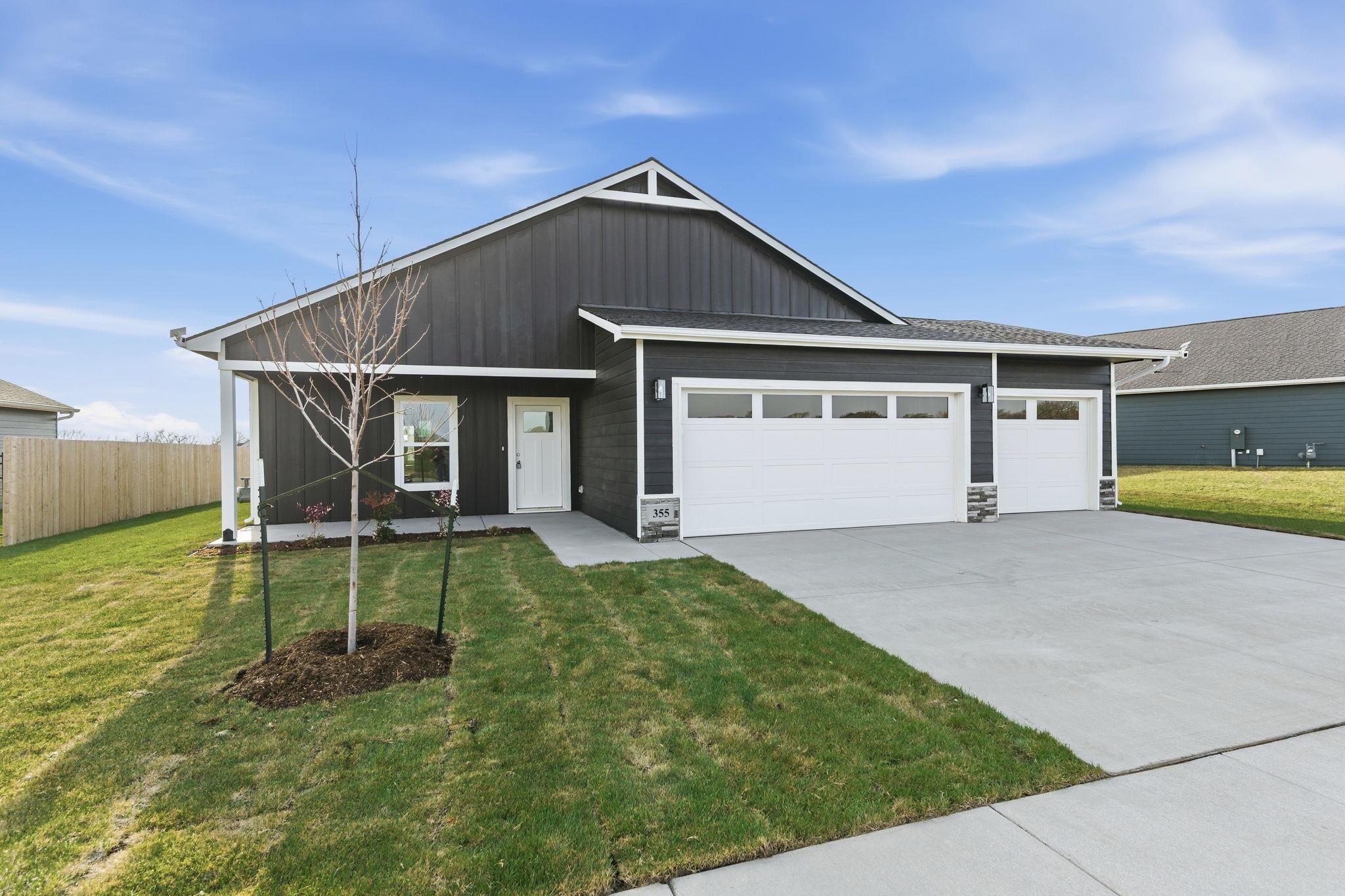 409 N Woodstone St, Derby, KS 67037-7814