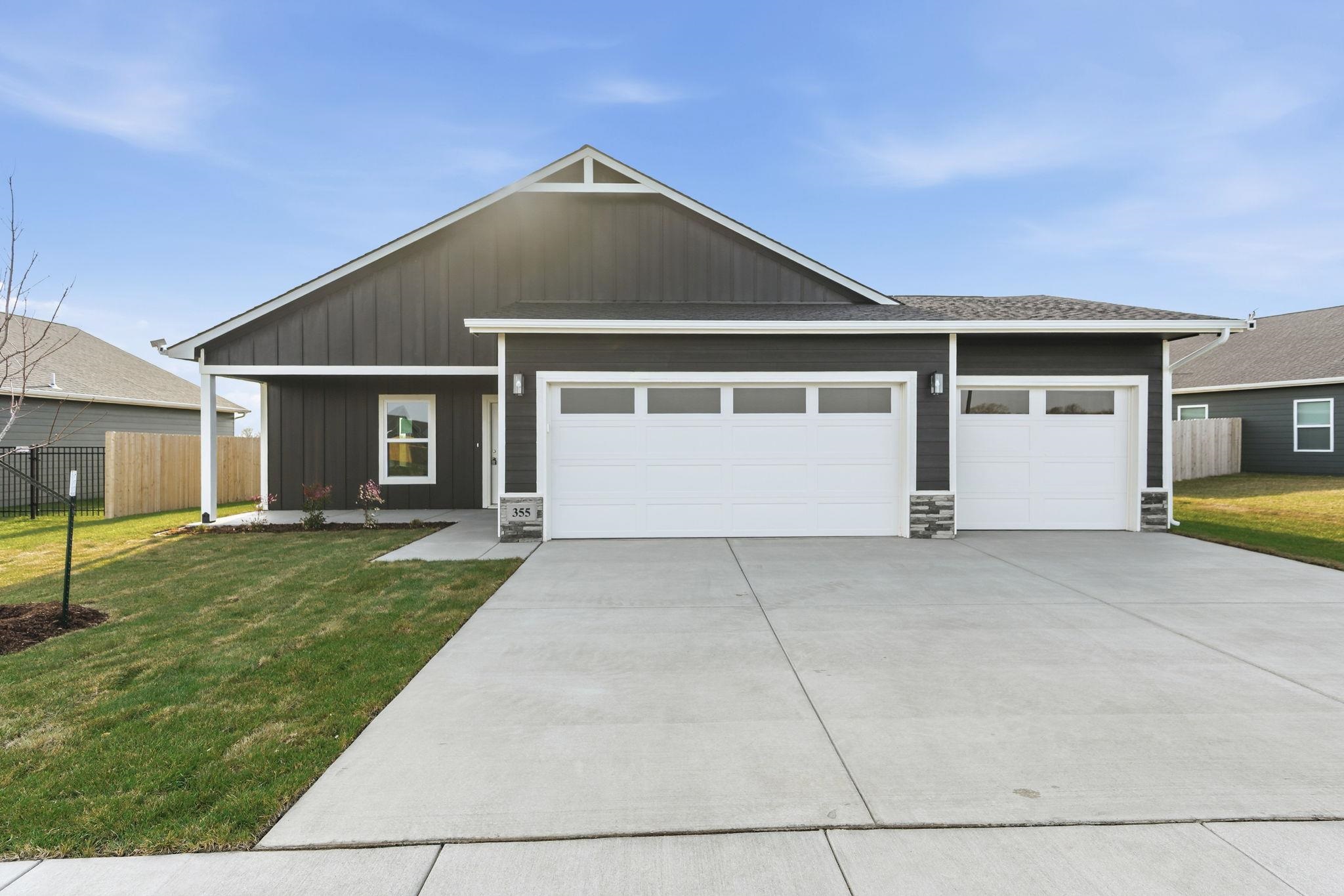 409 N Woodstone St, Derby, KS 67037-7814